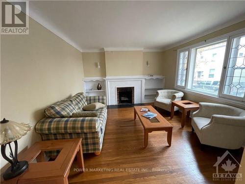 21 Perkins Street, Ottawa, ON - Indoor Photo Showing Living Room With Fireplace