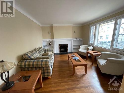 21 Perkins Street, Ottawa, ON - Indoor Photo Showing Living Room With Fireplace