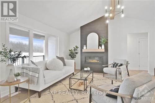 252 Trudeau Crescent, Russell, ON - Indoor Photo Showing Living Room With Fireplace