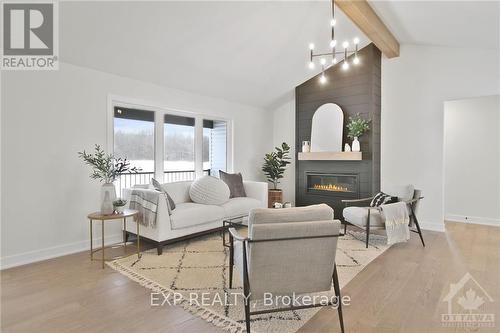 252 Trudeau Crescent, Russell, ON - Indoor Photo Showing Living Room With Fireplace