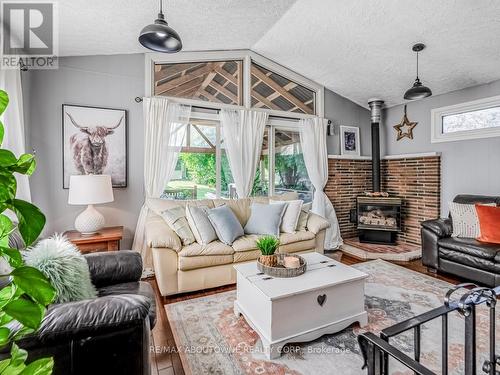 21 Badenoch Street, Puslinch, ON - Indoor Photo Showing Living Room With Fireplace