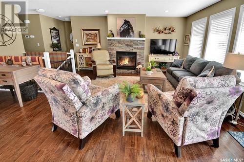 128 Mcdonald Street, Aberdeen, SK - Indoor Photo Showing Living Room With Fireplace