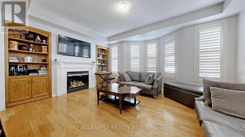 12 Winkler Terrace, Toronto, ON - Indoor Photo Showing Living Room With Fireplace