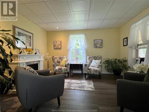 1009 East West Road, Pelee Island, ON - Indoor Photo Showing Living Room With Fireplace