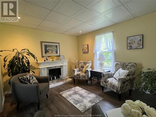 1009 East West Road, Pelee Island, ON - Indoor Photo Showing Living Room With Fireplace