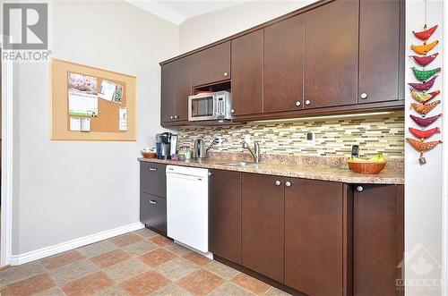 Convenient 2nd sink in coffee nook area. - 714 Pleasant Park Road, Ottawa, ON - Indoor Photo Showing Kitchen With Double Sink