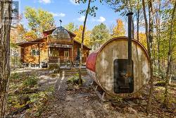 Back yard with fire pit and wood-fired sauna - 