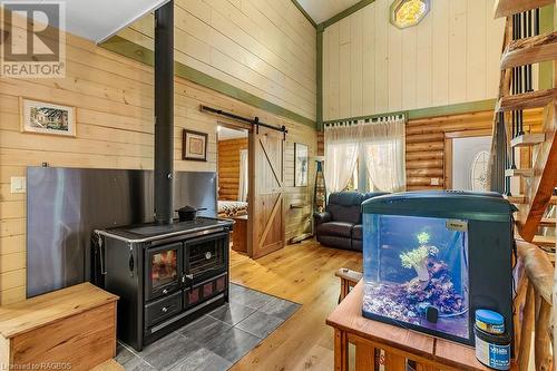 Lovely wood burning cookstove - 414499 Baseline Road, West Grey, ON - Indoor Photo Showing Other Room