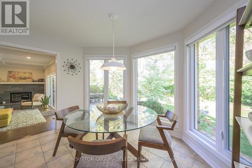 38 Ullswater Crescent, London, ON - Indoor Photo Showing Dining Room With Fireplace