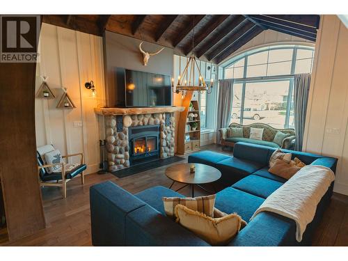 11728 103A Street, Fort St. John, BC - Indoor Photo Showing Living Room With Fireplace