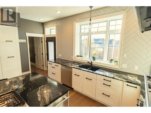 11728 103A Street, Fort St. John, BC - Indoor Photo Showing Kitchen With Double Sink With Upgraded Kitchen