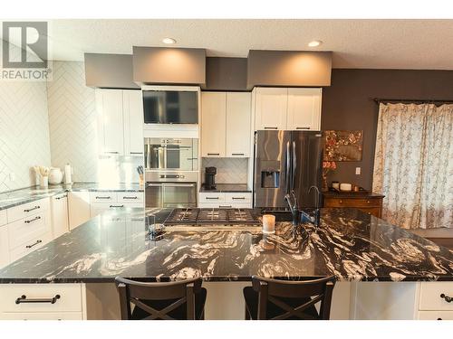 11728 103A Street, Fort St. John, BC - Indoor Photo Showing Kitchen With Upgraded Kitchen