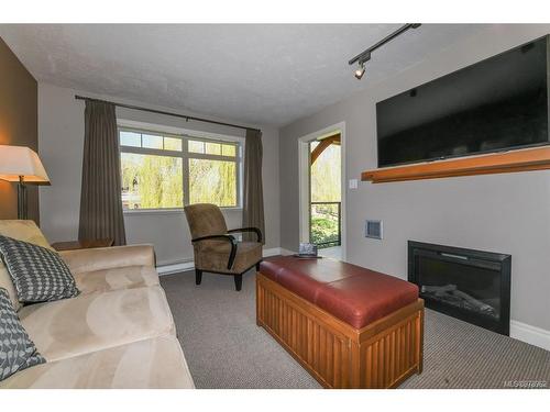 109B-1800 Riverside Lane, Courtenay, BC - Indoor Photo Showing Living Room With Fireplace