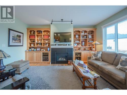 334 Chardonnay Avenue, Oliver, BC - Indoor Photo Showing Living Room With Fireplace