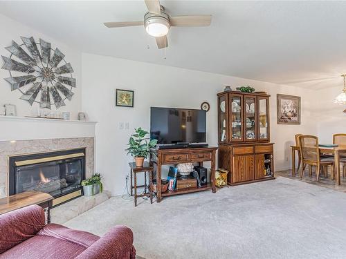 203-435 Morison Ave, Parksville, BC - Indoor Photo Showing Living Room With Fireplace