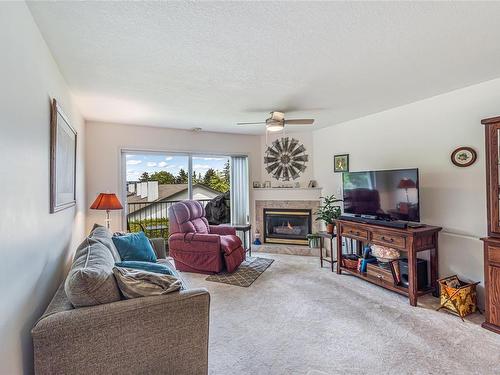 203-435 Morison Ave, Parksville, BC - Indoor Photo Showing Living Room With Fireplace