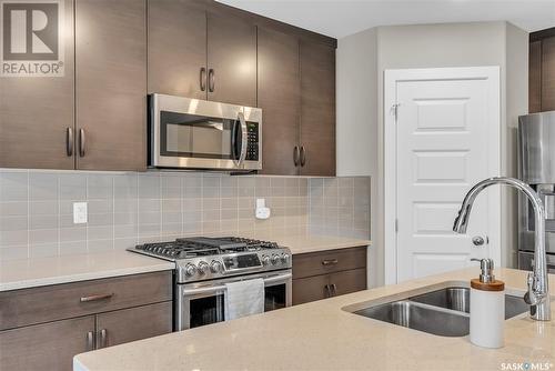 309 Germain Manor, Saskatoon, SK - Indoor Photo Showing Kitchen With Double Sink With Upgraded Kitchen