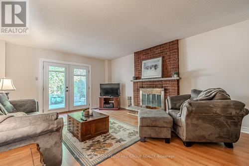 12 Moore Place, Barrie, ON - Indoor Photo Showing Living Room With Fireplace