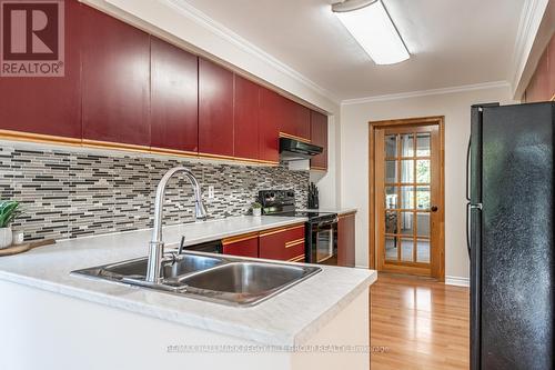 12 Moore Place, Barrie, ON - Indoor Photo Showing Kitchen With Double Sink