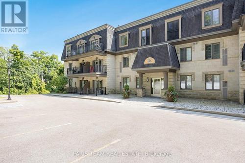 401 - 200 Collier Street, Barrie, ON - Outdoor With Facade