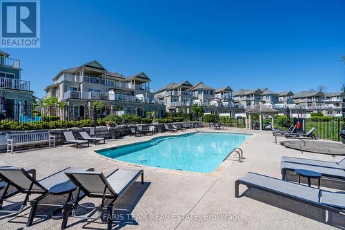 701 - 40 Trott Boulevard, Collingwood, ON - Outdoor With In Ground Pool