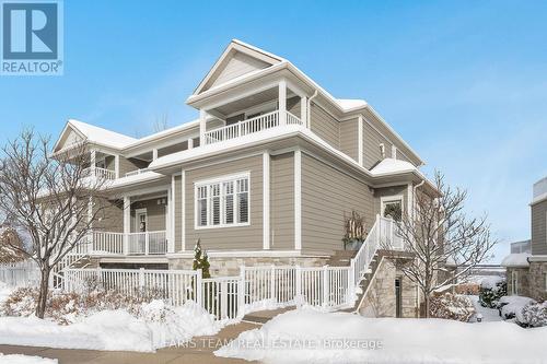 701 - 40 Trott Boulevard, Collingwood, ON - Outdoor With Deck Patio Veranda With Facade