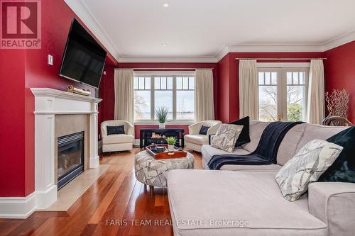 701 - 40 Trott Boulevard, Collingwood, ON - Indoor Photo Showing Living Room With Fireplace