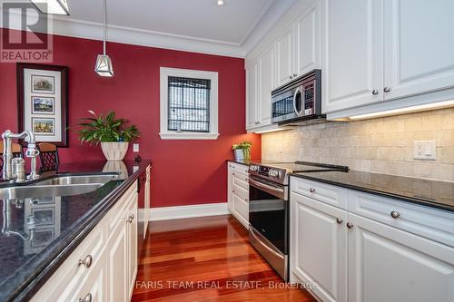 701 - 40 Trott Boulevard, Collingwood, ON - Indoor Photo Showing Kitchen With Double Sink