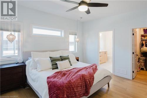 Primary bedroom with large walk-in-closet and 5 pc en-suite - 403 Northport Drive, Port Elgin, ON - Indoor Photo Showing Bedroom