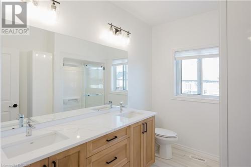 Double sink quartz countertop 5 PC bath - 403 Northport Drive, Port Elgin, ON - Indoor Photo Showing Bathroom