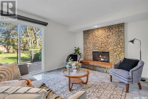 322 Highbury Terrace, Saskatoon, SK - Indoor Photo Showing Living Room With Fireplace