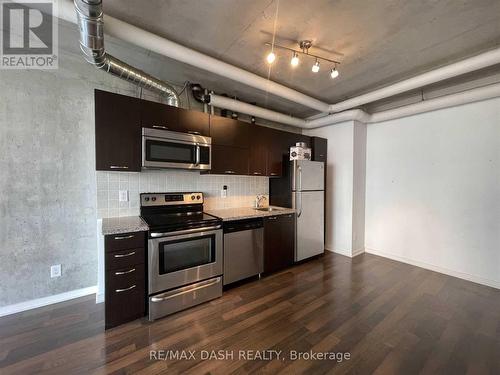 327 - 38 Joe Shuster Way, Toronto, ON - Indoor Photo Showing Kitchen