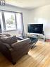 103 Mackie Crescent, Saskatoon, SK  - Indoor Photo Showing Living Room 