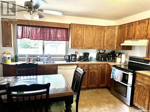 103 Mackie Crescent, Saskatoon, SK - Indoor Photo Showing Kitchen With Double Sink