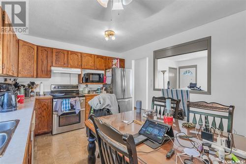 103 Mackie Crescent, Saskatoon, SK - Indoor Photo Showing Kitchen With Double Sink