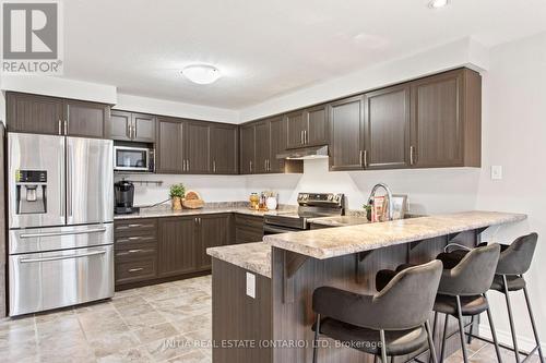 1931 Wateroak Drive, London, ON - Indoor Photo Showing Kitchen With Stainless Steel Kitchen With Upgraded Kitchen