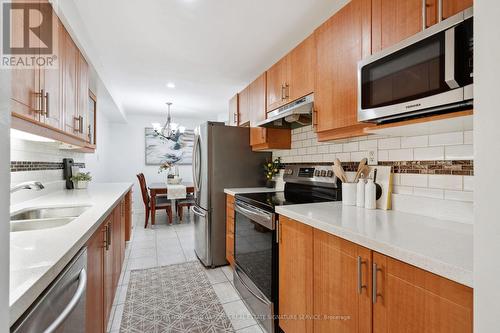 20 Scarfair Pathway, Toronto, ON - Indoor Photo Showing Kitchen With Double Sink