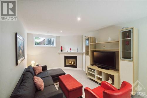 136 Marrissa Avenue, Ottawa, ON - Indoor Photo Showing Living Room With Fireplace