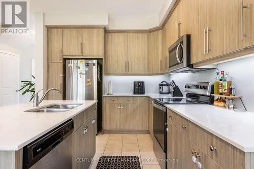 110 - 177 Edgevalley Road, London, ON - Indoor Photo Showing Kitchen With Double Sink