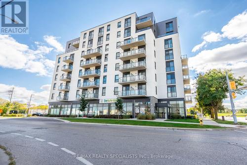 209 - 7 Erie Avenue, Brantford, ON - Outdoor With Balcony With Facade