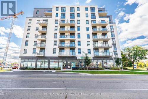 209 - 7 Erie Avenue, Brantford, ON - Outdoor With Balcony With Facade