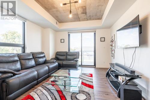 209 - 7 Erie Avenue, Brantford, ON - Indoor Photo Showing Living Room