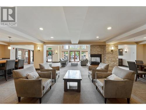 1075 Sunset Drive Unit# 505, Kelowna, BC - Indoor Photo Showing Living Room With Fireplace