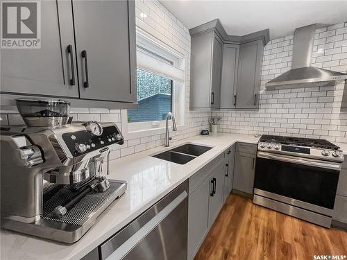 306 Meadow Ridge Drive, Candle Lake, SK - Indoor Photo Showing Kitchen With Double Sink With Upgraded Kitchen