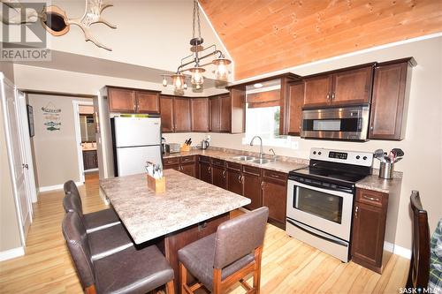 104 Sunridge Road, Pebble Baye, SK - Indoor Photo Showing Kitchen With Double Sink