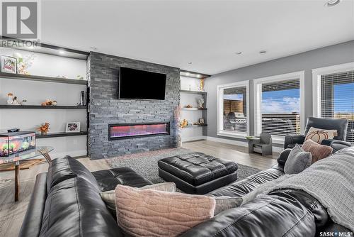 104 Aspen Way, Aberdeen Rm No. 373, SK - Indoor Photo Showing Living Room With Fireplace