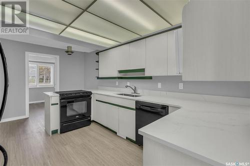 1024 Gryphons Walk, Regina, SK - Indoor Photo Showing Kitchen With Double Sink