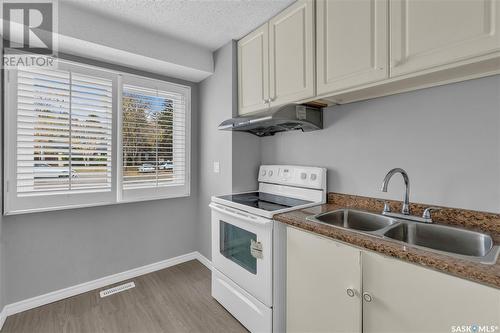 1024 Gryphons Walk, Regina, SK - Indoor Photo Showing Kitchen With Double Sink