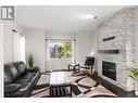 600 Sherwood Road Unit# 13, Kelowna, BC  - Indoor Photo Showing Living Room With Fireplace 