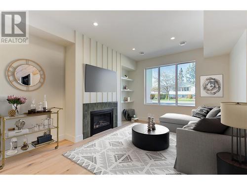 857 Kinnear Court, Kelowna, BC - Indoor Photo Showing Living Room With Fireplace